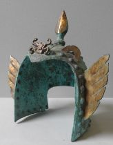 A CHINESE ARCHAIC STYLE HELMET, 20TH CENTURY, the cast metal helmet surmounted by a finial and