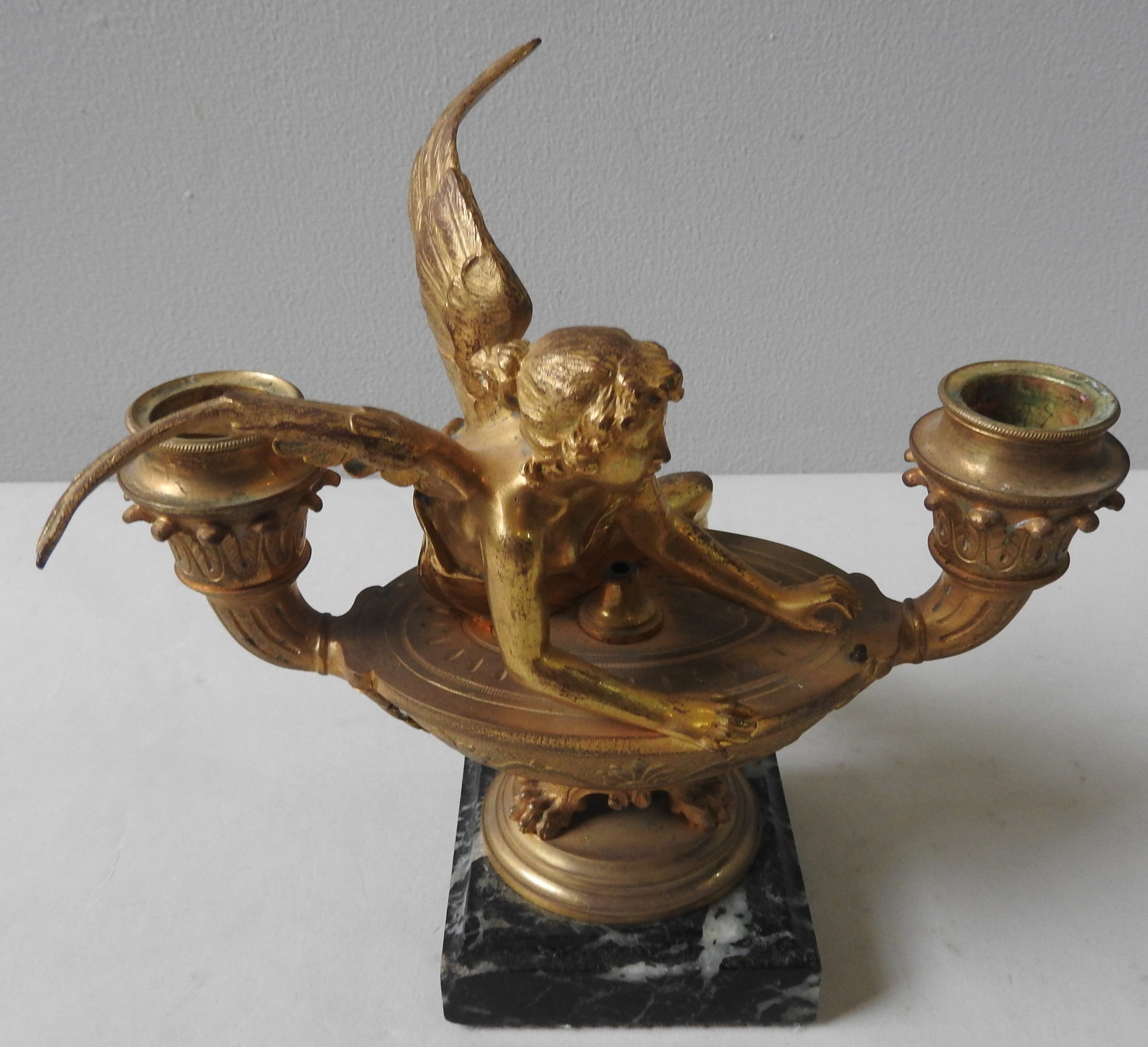 A GILT BRONZE CANDLE HOLDER, 19TH CENTURY, in the form of a classical oval shaped urn flanked by - Image 2 of 3