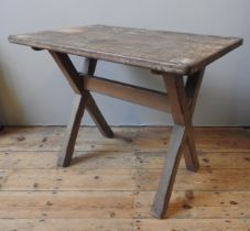 A RUSTIC PINE TAVERN TABLE, LATE 19TH / EARLY 20TH CENTURY, the rectangular plank top raised on '