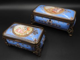 TWO FRENCH LIMOGES ENAMEL BOXES, CIRCA 1900, the blue ground decorated with romantic scenes with