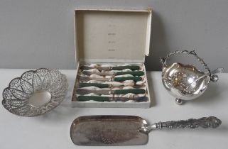 A SILVER PLATED SUGAR BASKET AND SIFTING SPOON, FILIGREE BOWL AND CRUMB SCOOP, the basket with an