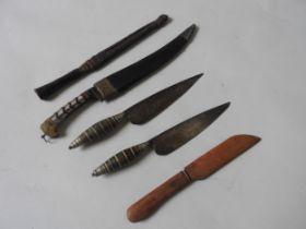 A TURKISH KNIFE, THE HANDLE WITH CONCENTRIC BANDS OF DECORATION, one dated 1903, another similar,