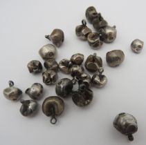 A COLLECTION OF EASTERN SILVER BUTTONS of spherical flattened form each bearing two stamped