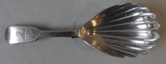 A GEORGE III IRISH SILVER CADDY SPOON, fiddle pattern handle with engraved eagle insignia, with an