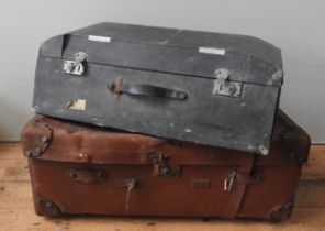 A VINTAGE LEATHER TRAVEL TRUNK AND AN AUTOMOBILE TRUNK, the pig skin case with vintage labels