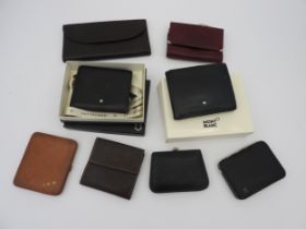 A MONT BLANC LEATHER WALLET, boxed but used, and various other wallets and purses.