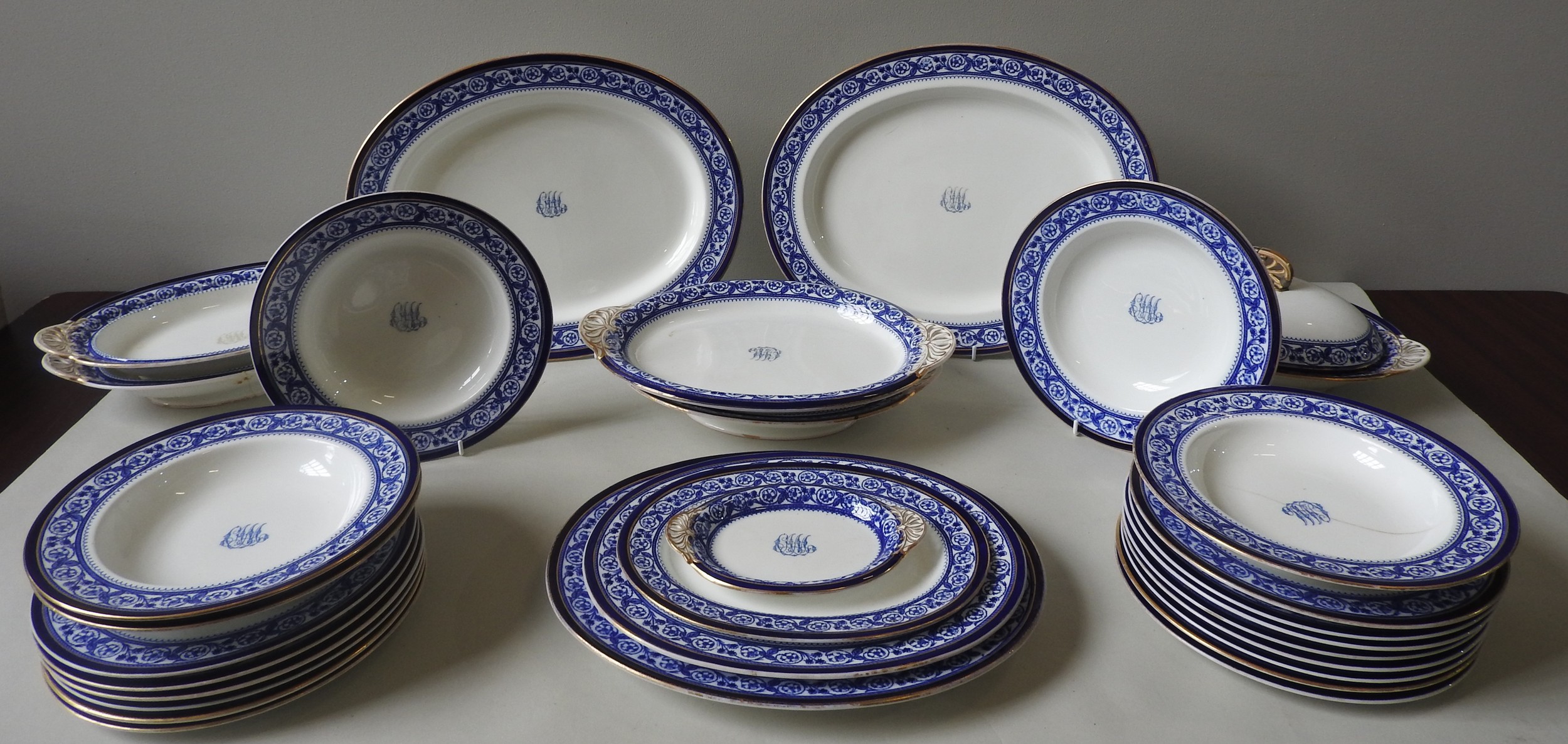 A QUANTITY OF COPELAND DINNER WARES, CIRCA 1880, blue glaze scrolling foliate and flower head border