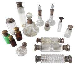 A GROUP OF THIRTEEN GLASS SCENT BOTTLES, LATE 19TH / EARLY 20TH CENTURY, including three 'double