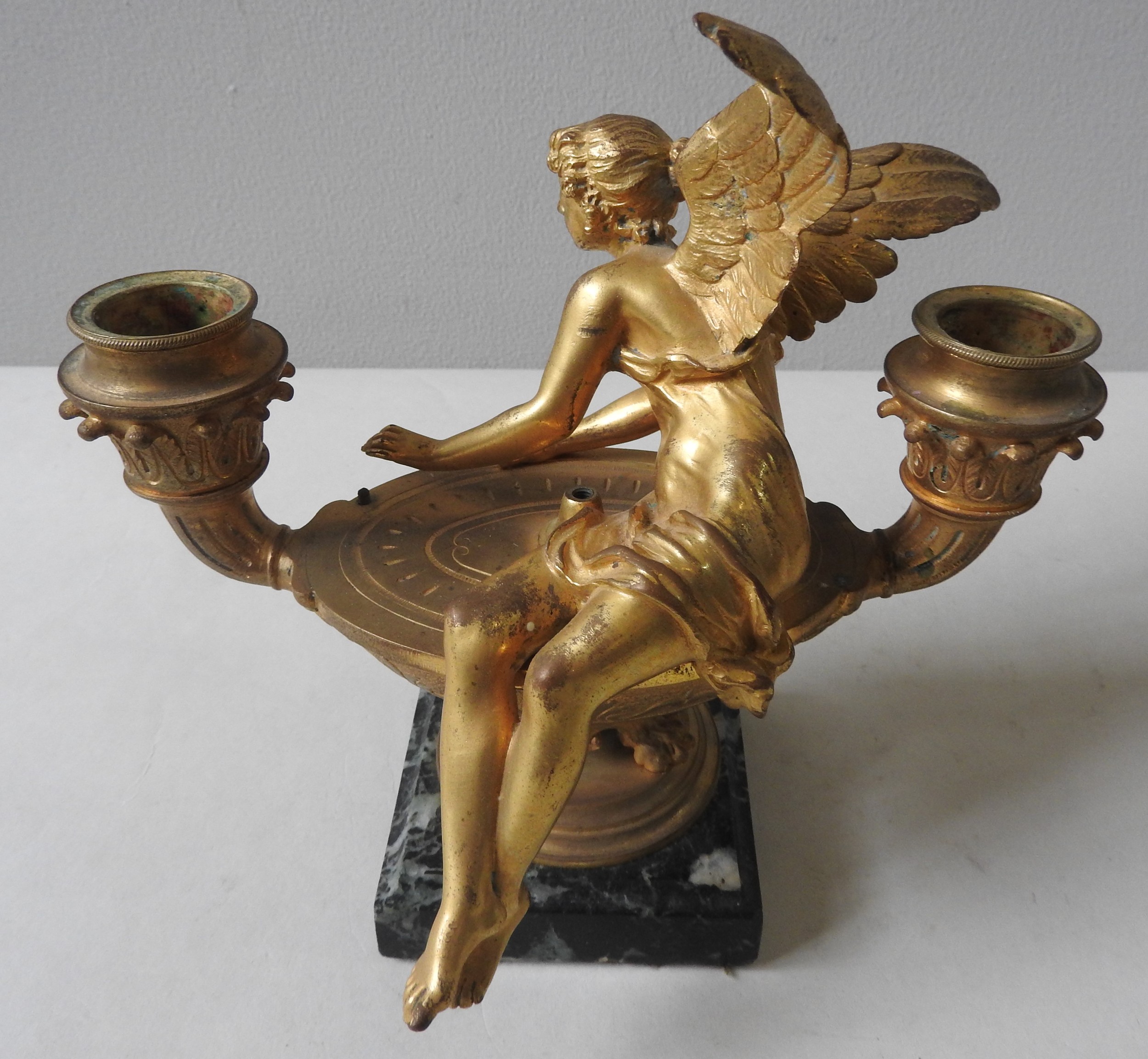 A GILT BRONZE CANDLE HOLDER, 19TH CENTURY, in the form of a classical oval shaped urn flanked by
