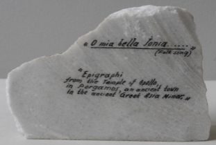 A CARVED CALLIGRAPHIC MARBLE FRAGMENT annotated verso in pen 'O mia bella Iona..... (folk song)