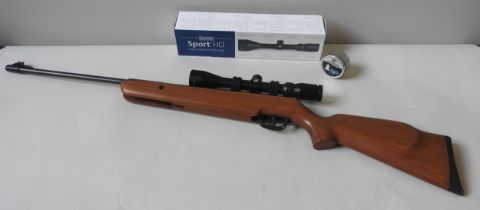 AN SMK 19-18 .22 CALIBRE AIR RIFLE WITH HAWKE SPORT HD TELESCOPIC SIGHT.  The Purchaser of this