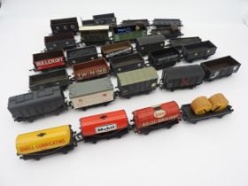 28 ASSORTED WAGONS BY DUBLO, WRENN AND HORNBY RAILWAYS. Some repainted. Average to good condition.