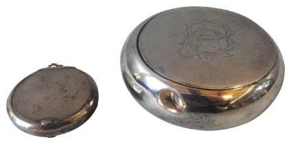 A SILVER CIRCULAR COMPACT AND A SILVER POWDER BOWL ,the twin hinged compact marked Birmingham