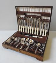 A CANTEEN OF SILVER PLATED CUTLERY, six place setting (missing one meat carving fork) by W & J.A