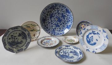 A CHINESE KANGXI CHARGER, damaged, two 18th century blue and white export plates, two other 18th