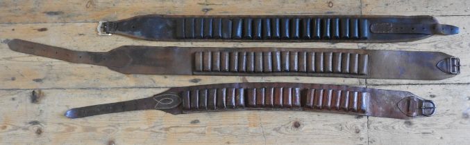 THREE VINTAGE LEATHER CARTRIDGE BELTS, 19TH CENTURY, one black and two tan colour 116 cm max