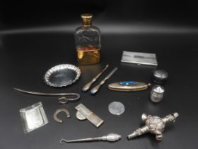 A GROUP OF FIVE NOVELTY SILVER ITEMS, the lot including a Links of London bookmark, an engine turned