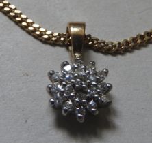 A 9CT GOLD DIAMOND CLUSTER PENDANT ON A 9CT GOLD CHAIN, the pendant of flower head form, the chain