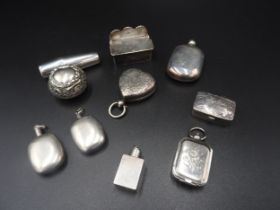 A GROUP OF SILVER AND WHITE METAL WARES INCLUDING A HEART SHAPED SOVEREIGN PURSE, along with three