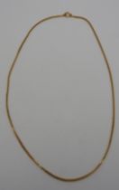 A 9CT GOLD FLAT LINK CHAIN 27 cm long, 11.2 grams