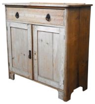 A WAXED PINE DRESSER BASE, 19TH CENTURY,  rectangular top over a long frieze drawer, above two