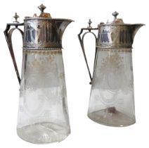 A PAIR OF SILVER MOUNTED VICTORIAN CLARET JUGS, tapering oval form with acid etched cartouche and