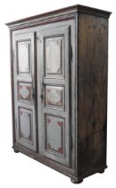 A RUSTIC PINE CONTINENTAL TWO DOOR CUPBOARD, 19TH CENTURY, sturdy simplistic pegged form with an