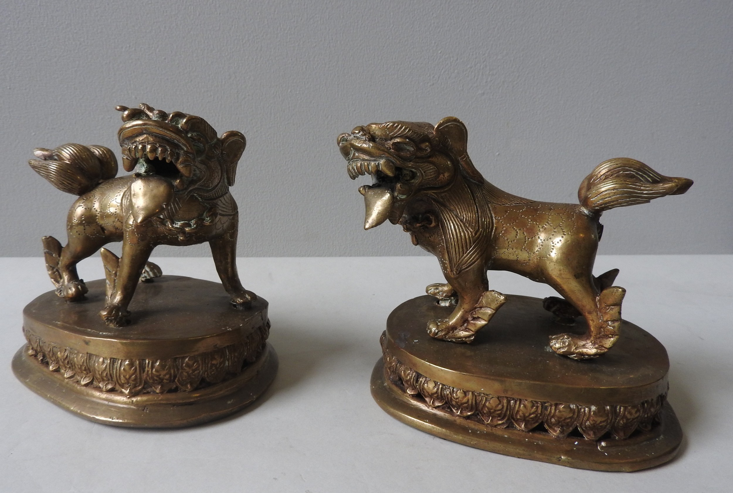 A PAIR OF LAQUERED BRASS CHINESE LIONS, QING DYNASTY, standing foursquare on lotus bases 14 cm high - Image 2 of 4