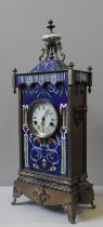 A LATE 19TH CENTURY FRENCH BRASS AND CLOISONNE CLOCK CASE, surmounted by a porcelain finial over a