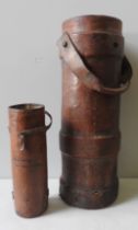 A FIRSRT WORLD WAR LEATHER SHELL CARRIER AND A SMALLER SHELL CARRIER, the smaller carrier