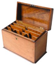 A 19TH CENTURY MAHOGANY STATIONERY BOX, the hinged sloping lid enclosing a compartmented interior 23