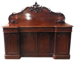 A LATE VICTORIAN MAHOGANY MAHOGANY SIDEBOARD, CIRCA 1880, inverted breakfront form with an ornate