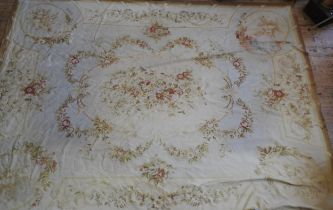 A LARGE AUBUSSON RUG, 20TH CENTURY, central cream cartouche decorated with floral sprays and