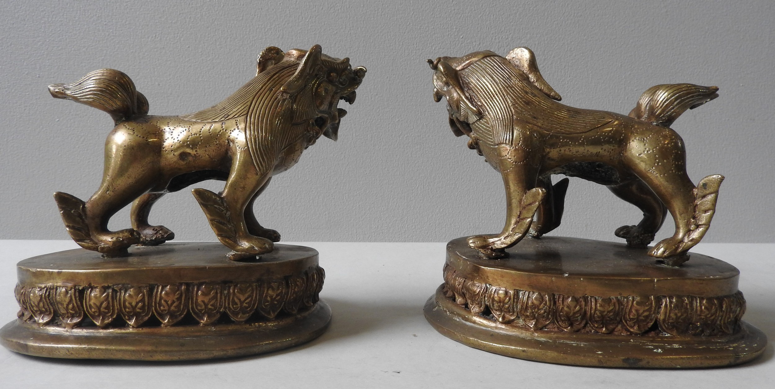 A PAIR OF LAQUERED BRASS CHINESE LIONS, QING DYNASTY, standing foursquare on lotus bases 14 cm high - Image 4 of 4