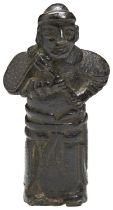 A BRONZE FIGURE OF A PRIEST YUAN / EARLY MING DYNASTY modelled standing in long flowing robe and