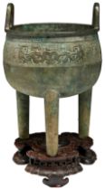 A BRONZE RITUAL TRIPOD FOOD VESSEL, ZHU DING MING DYNASTY the well rounded sides with a pair of bail