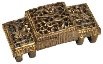 A SMALL GILT-BRONZE 'DRAGON' BUCKLE QING DYNASTY, 19TH CENTURY pierced with three beasts entwined in