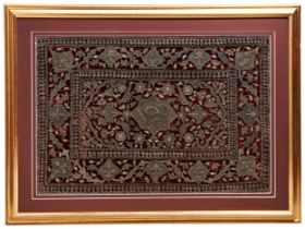 A QAJAR METAL-THREAD EMBROIDERED RED VELVET PANEL PERSIA, 19TH CENTURY the red velvet ground