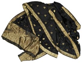 AN INDIAN BLACK SILK SAREE 20TH CENTURY embroidered in gilt thread with stylised animals