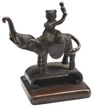 A SMALL BRONZE SEAL 18TH / 19TH CENTURY modelled as an elephant and rider 5cm high