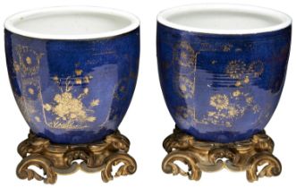 A GOOD PAIR OF POWDER BLUE AND GILT-DECORATED JARDINIERES KANGXI PERIOD (1662-1722) the sides