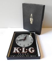 A KLG PLUGS CLOCK PLUS BOX A rare glass Smiths 'Sectric' garage wall clock, branded 'KLG Plugs TOO