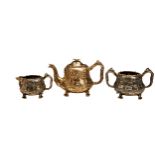 A THREE PIECE SILVER GILT TEA SET, SAMUEL WHITFORD, LONDON 1865. A good quality cast and embossed