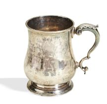 A HALF PINT MUG, LONDON 1775. A baluster shape mug with an acanthus 'S' scroll handle. Made by the