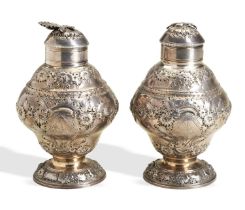 A PAIR OF GEORGE II SILVER TEA CADDIES, LONDON 1752. A pair of florally embossed baluster shape