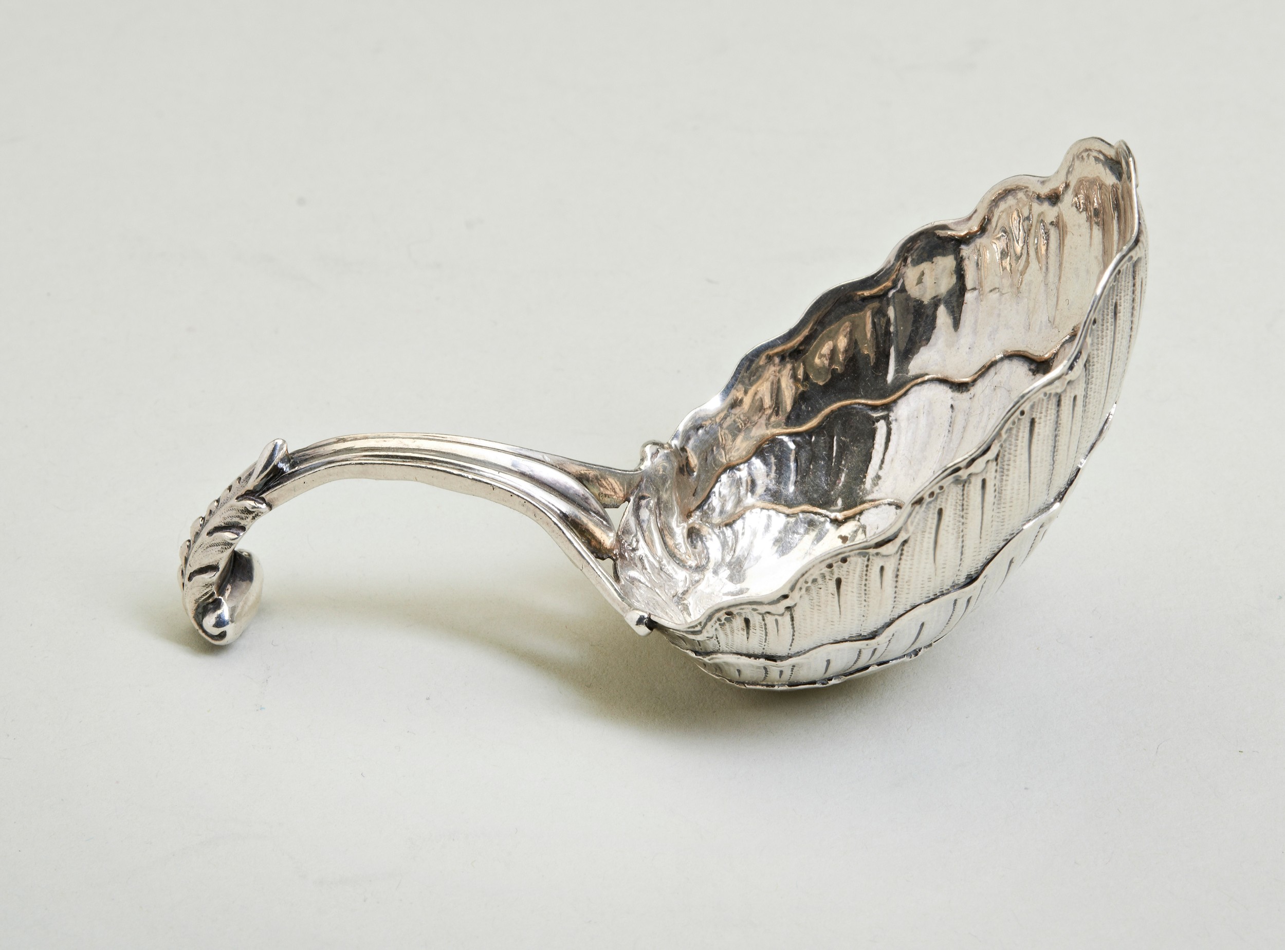 A SHELL BOWL CADDY SPOON, POSSIBLY DUTCH C.1770. A rather large caddy spoon with a curved acanthus - Image 3 of 3