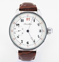 A STEEL WRISTWATCH containing a Hamilton movement, the movement signed Hamilton Watch Co,