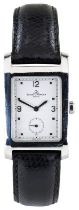 BAUME AND MERCIER: A HAMPTON STAINLESS STEEL WRISTWATCH signed white dial with subsidiary seconds,