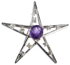 AN AMETHYST AND DIAMOND STAR BROOCH the rose-cut amethyst within a five pointed open work star
