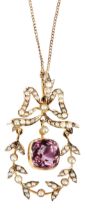 A LATE VICTORIAN PINK TOURMALINE AND SEED PEARL GARLAND PENDANT, CIRCA 1890 a bow motif set with